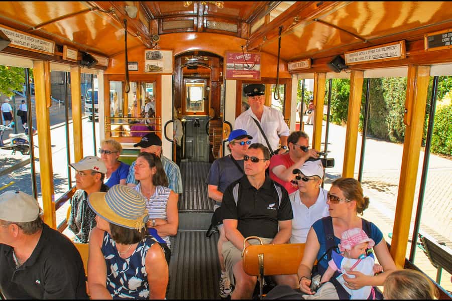 Christchurch: Tram, Punt and Gondola Ride Combo Ticket - Riding the vintage hop-on hop-off tram loop from Cathedral Junction