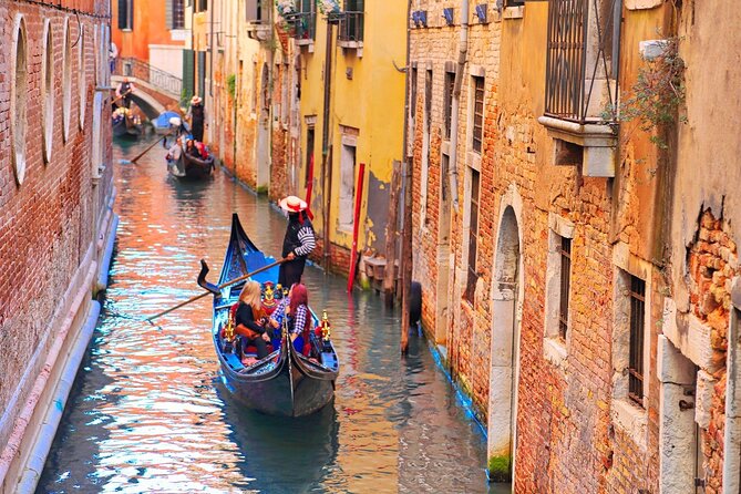 Venice Classic Gondola Ride Along Grand Canal and Hidden Corners - Entering the Gondola: What the Shared Format Really Means