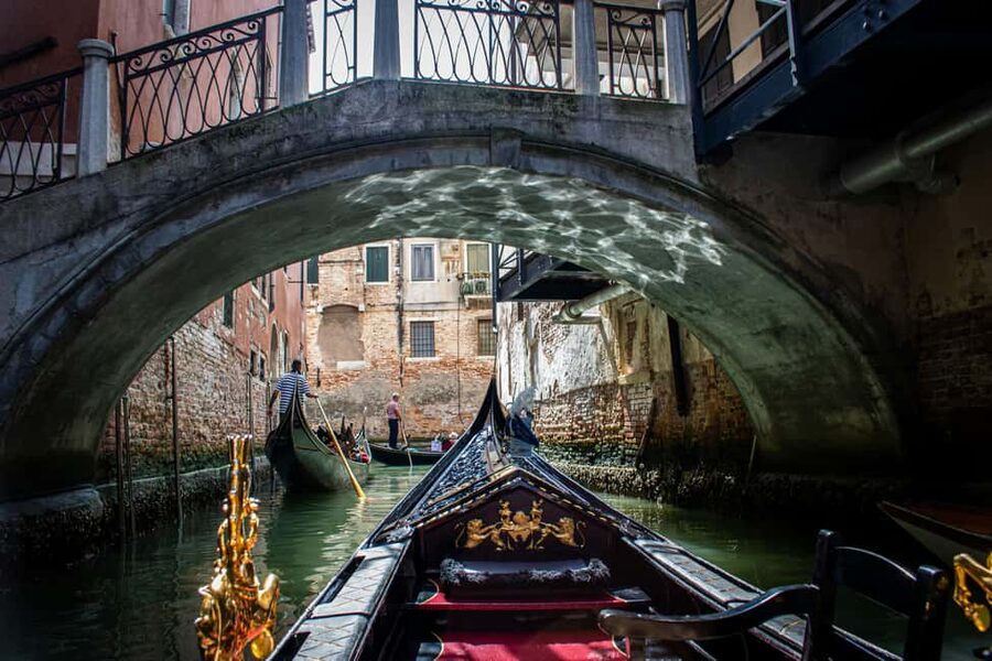 Venice: Gondola Ride under the Bridge of Sighs with Audio Guide App - The gondola ride under the Bridge of Sighs: shared boat, big atmosphere