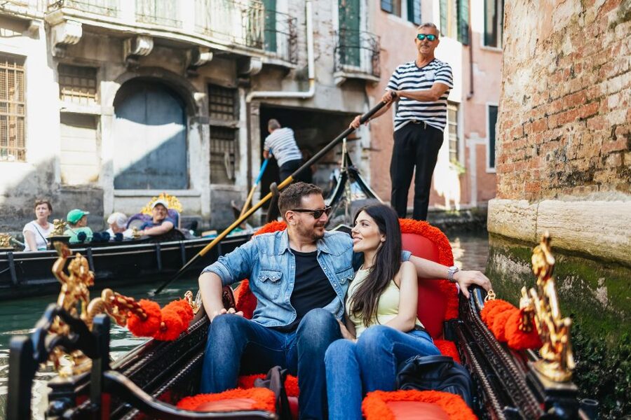 Venice: Grand Canal Gondola Ride with App Commentary - Quiet canals, side passages, and the payoff of shared boats