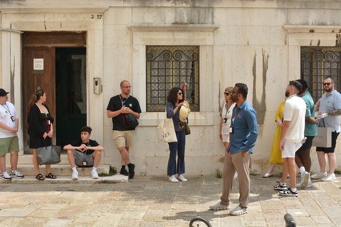 Venice Walking Tour with Gondola Ride Experience - The Bridge of Sighs viewpoint: a romantic finish from the water